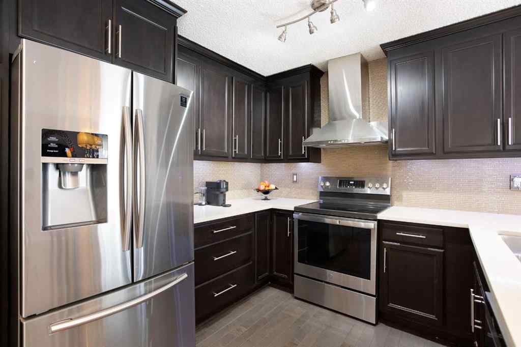 MLS® A2222003 - 56 Strathclair Place SW in Strathcona Park Calgary, Residential