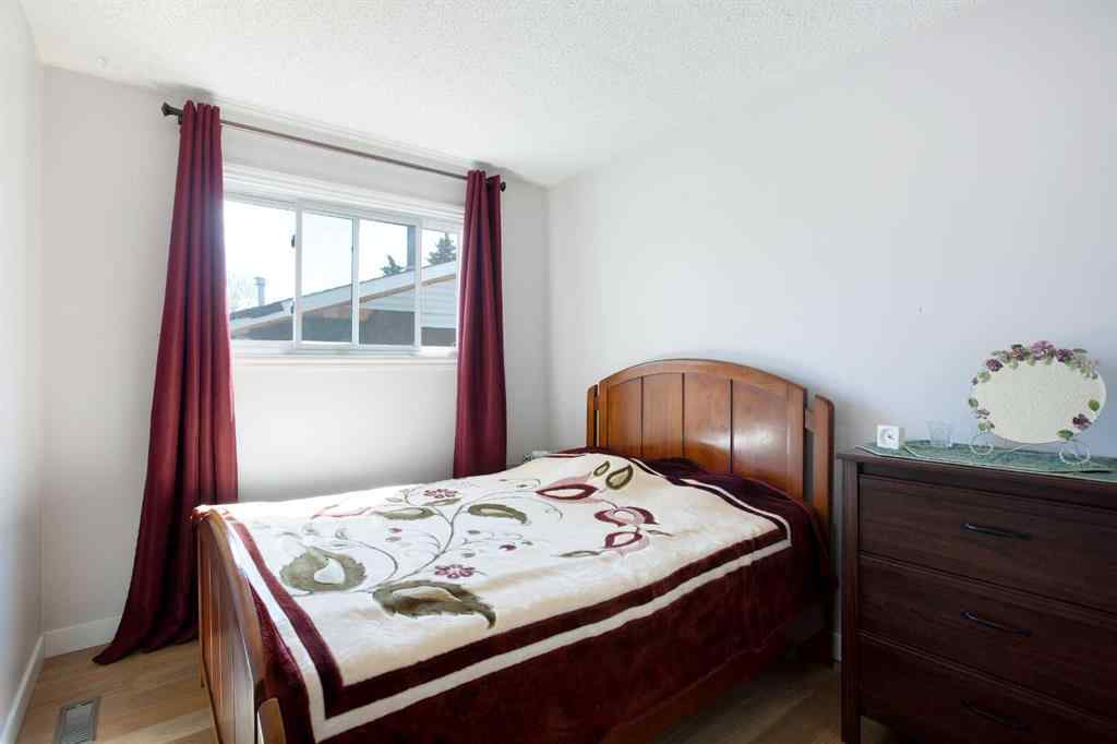 MLS® A2222003 - 56 Strathclair Place SW in Strathcona Park Calgary, Residential