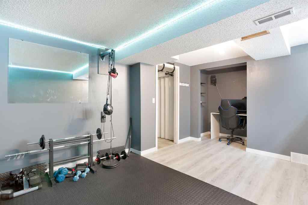 MLS® A2222003 - 56 Strathclair Place SW in Strathcona Park Calgary, Residential