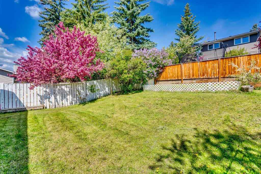 MLS® A2222003 - 56 Strathclair Place SW in Strathcona Park Calgary, Residential