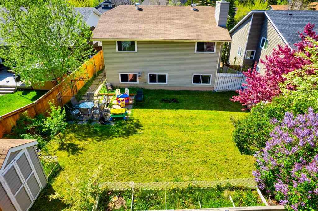 MLS® A2222003 - 56 Strathclair Place SW in Strathcona Park Calgary, Residential