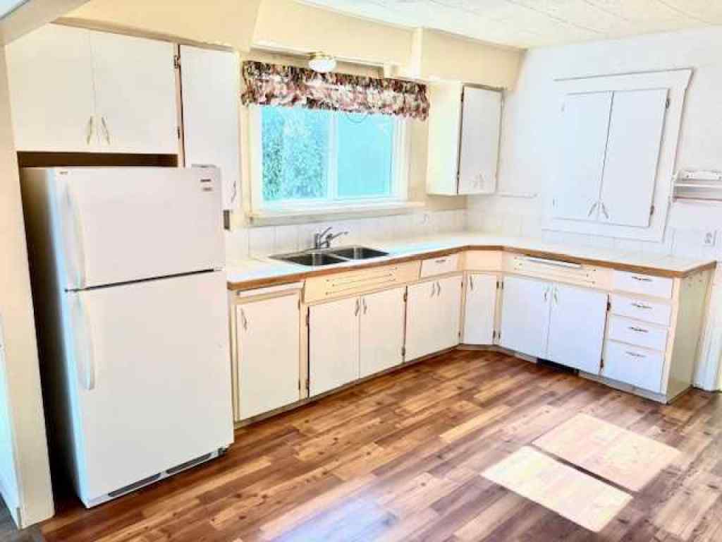 MLS® A2222006 - 1316 Dinosaur Trail  in Midland Drumheller, Residential