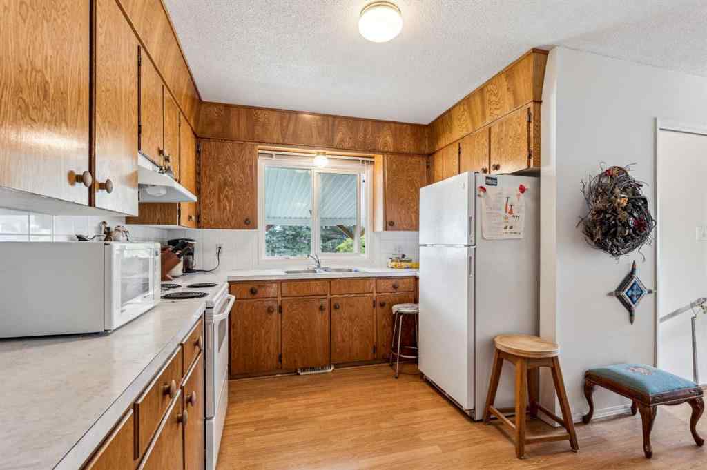 MLS® A2222022 - 201 11 Avenue SW in Old Rodeo Grounds High River, Residential