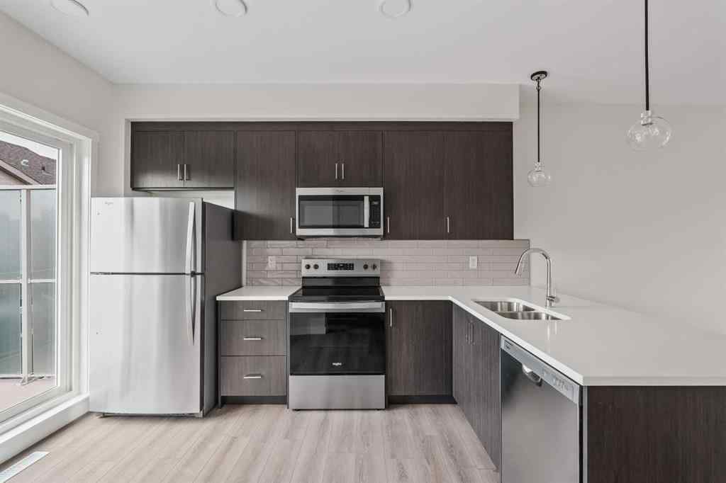 MLS® A2222190 - 515 Shawnee Square SW in Shawnee Slopes Calgary, Residential