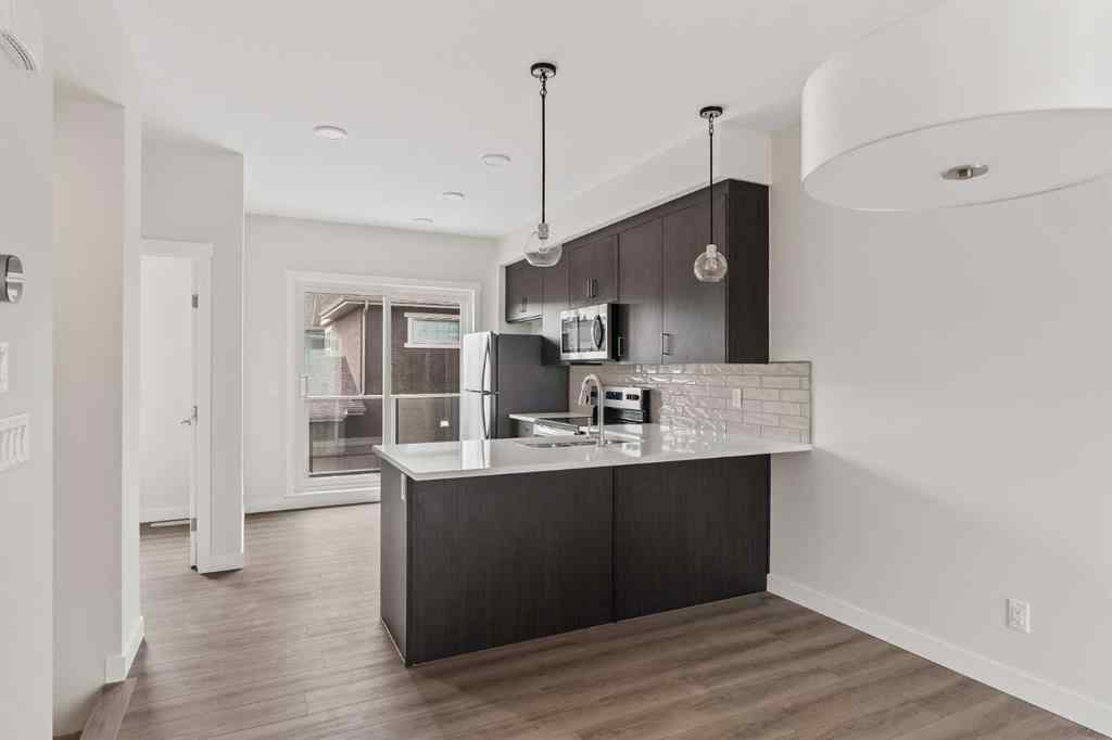 MLS® A2222190 - 515 Shawnee Square SW in Shawnee Slopes Calgary, Residential