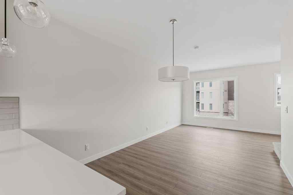 MLS® A2222190 - 515 Shawnee Square SW in Shawnee Slopes Calgary, Residential