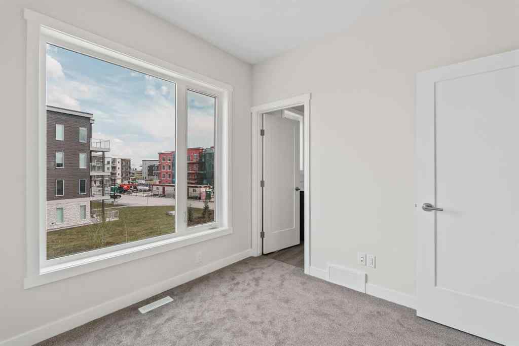 MLS® A2222190 - 515 Shawnee Square SW in Shawnee Slopes Calgary, Residential