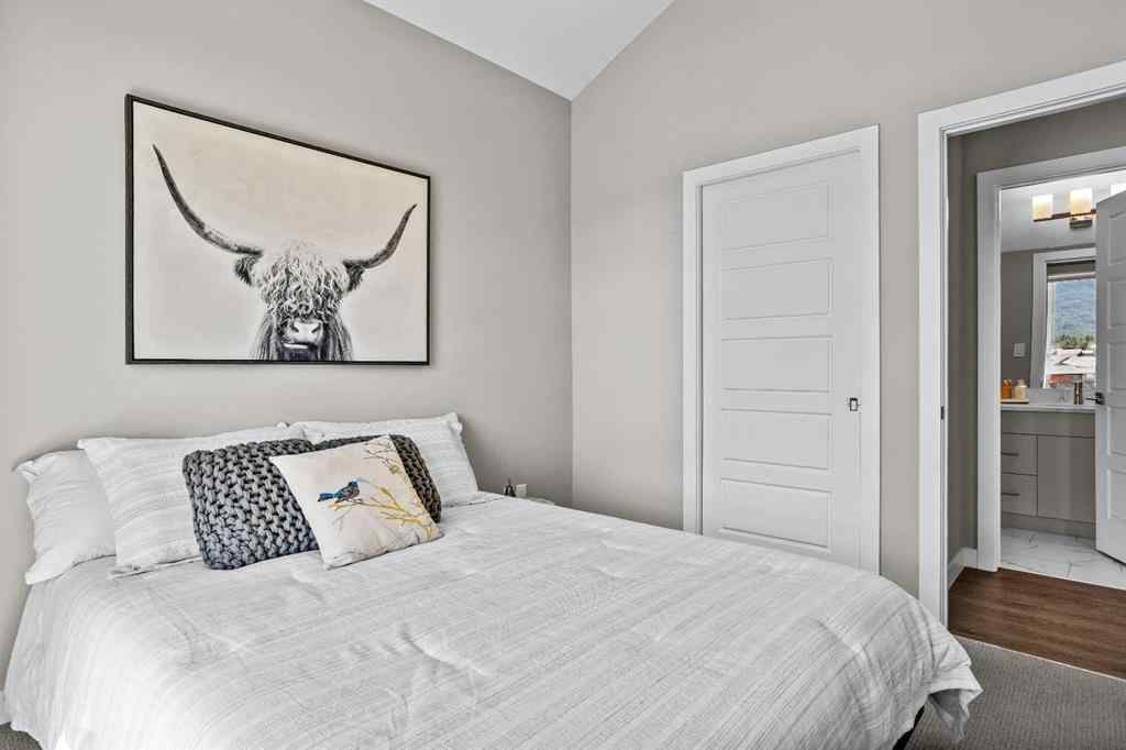 MLS® A2222314 - Unit #316 106 Stewart Creek Rise  in Three Sisters Canmore, Residential
