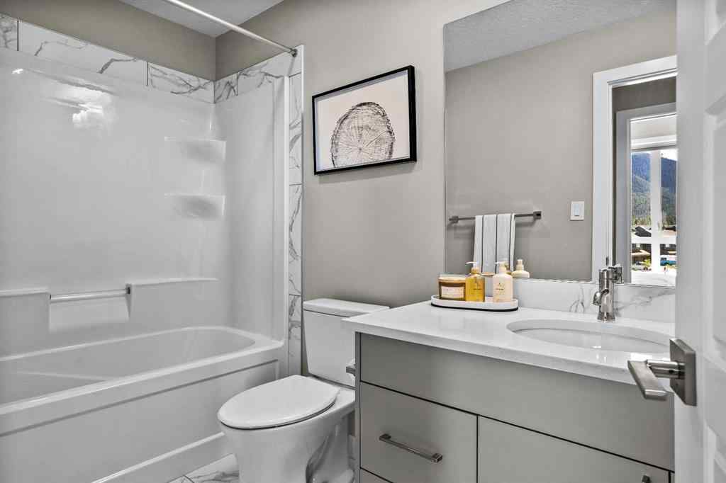 MLS® A2222314 - Unit #316 106 Stewart Creek Rise  in Three Sisters Canmore, Residential