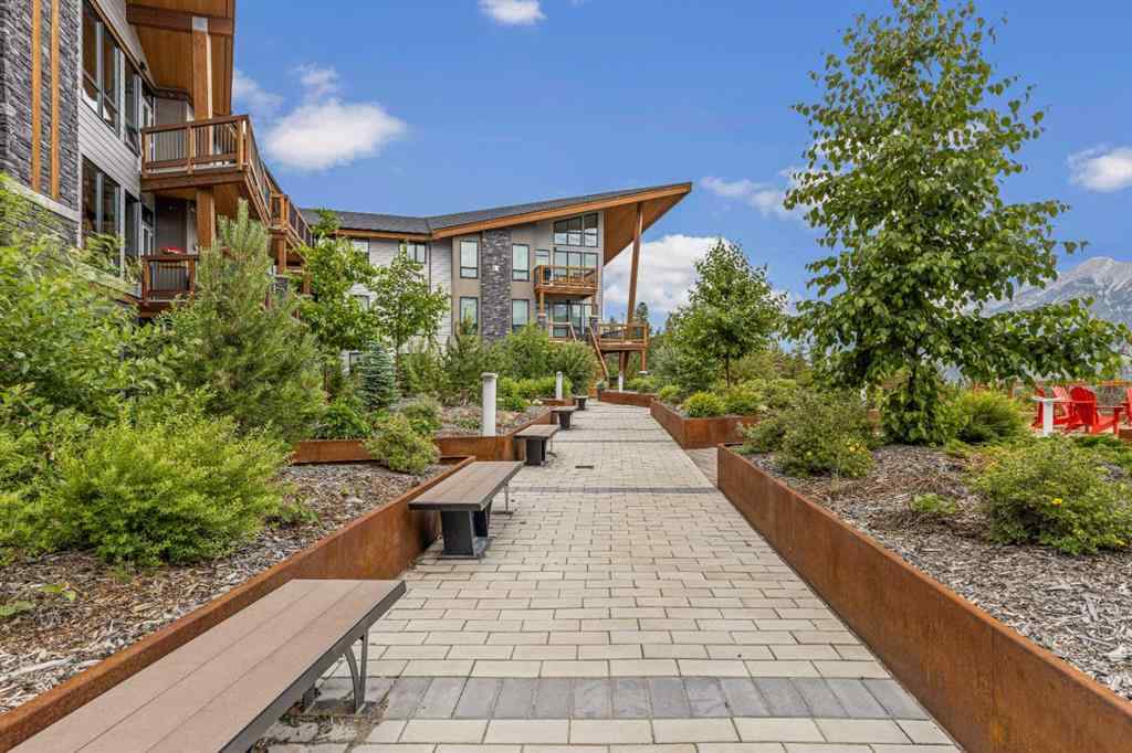 MLS® A2222314 - Unit #316 106 Stewart Creek Rise  in Three Sisters Canmore, Residential