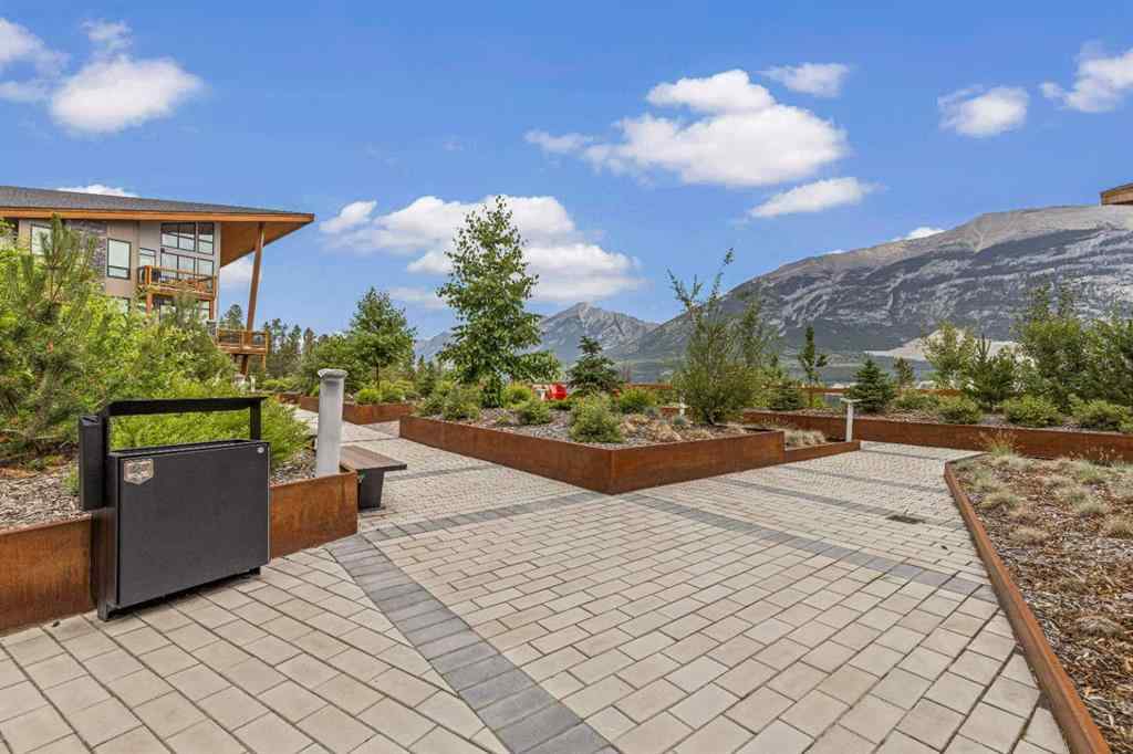 MLS® A2222314 - Unit #316 106 Stewart Creek Rise  in Three Sisters Canmore, Residential