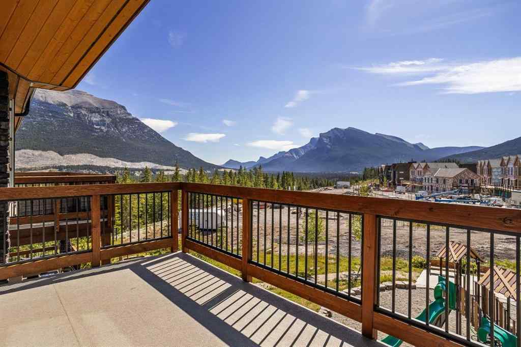 MLS® A2222314 - Unit #316 106 Stewart Creek Rise  in Three Sisters Canmore, Residential