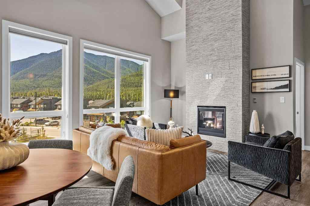 MLS® A2222314 - Unit #316 106 Stewart Creek Rise  in Three Sisters Canmore, Residential
