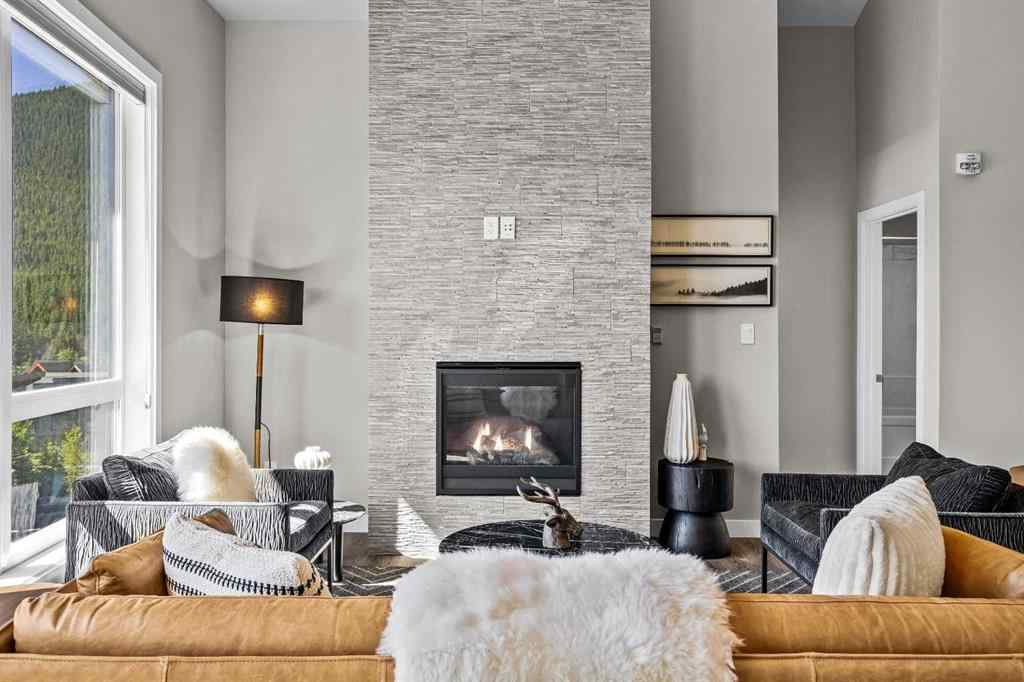 MLS® A2222314 - Unit #316 106 Stewart Creek Rise  in Three Sisters Canmore, Residential