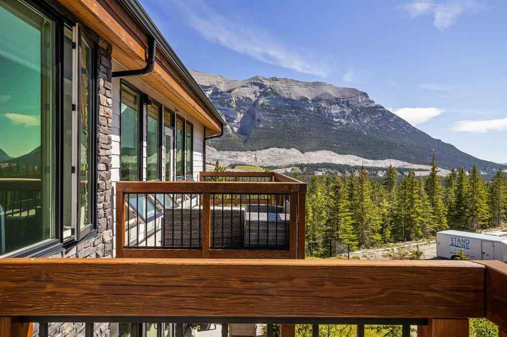 MLS® A2222314 - Unit #316 106 Stewart Creek Rise  in Three Sisters Canmore, Residential