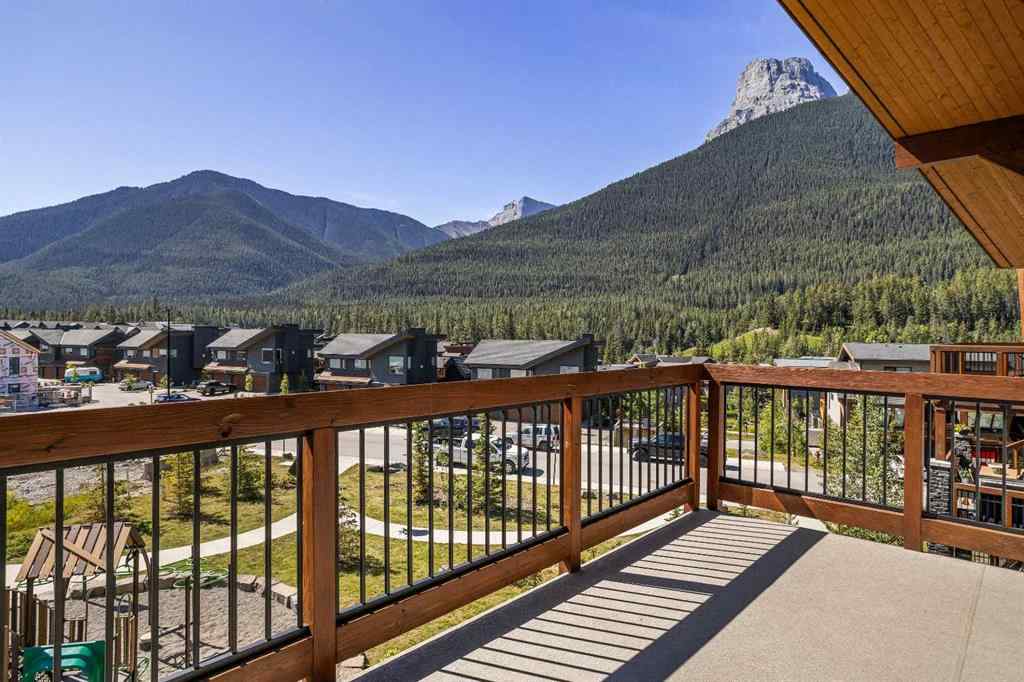 MLS® A2222314 - Unit #316 106 Stewart Creek Rise  in Three Sisters Canmore, Residential