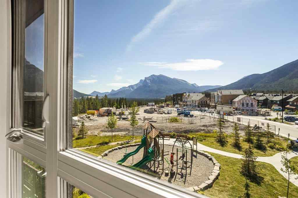 MLS® A2222314 - Unit #316 106 Stewart Creek Rise  in Three Sisters Canmore, Residential