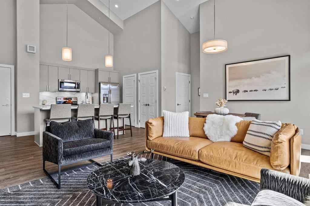 MLS® A2222314 - Unit #316 106 Stewart Creek Rise  in Three Sisters Canmore, Residential