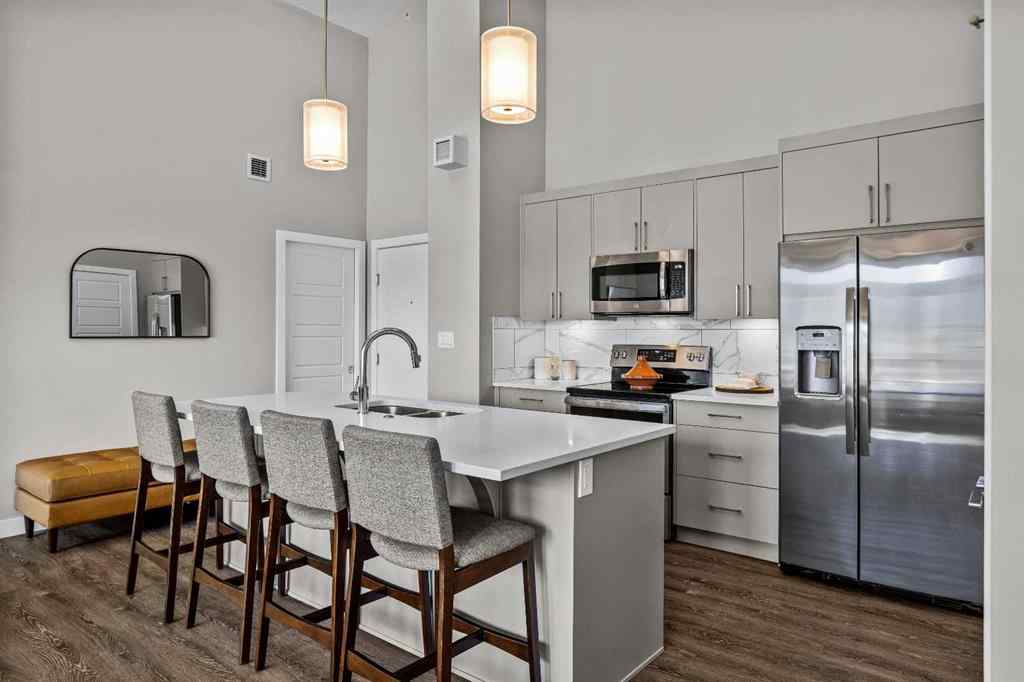 MLS® A2222314 - Unit #316 106 Stewart Creek Rise  in Three Sisters Canmore, Residential