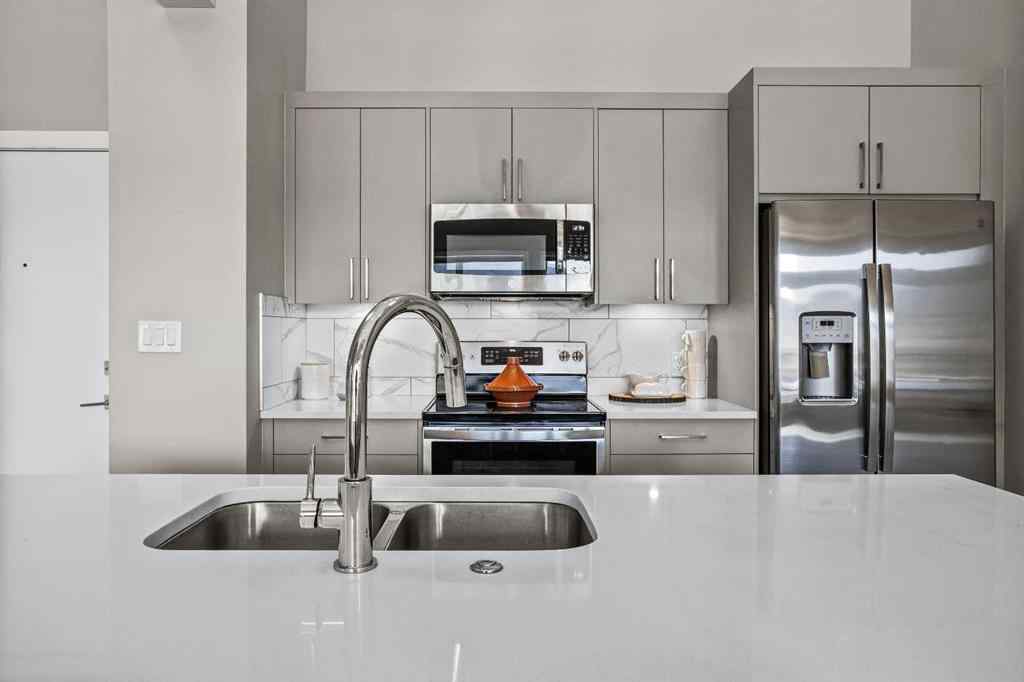 MLS® A2222314 - Unit #316 106 Stewart Creek Rise  in Three Sisters Canmore, Residential