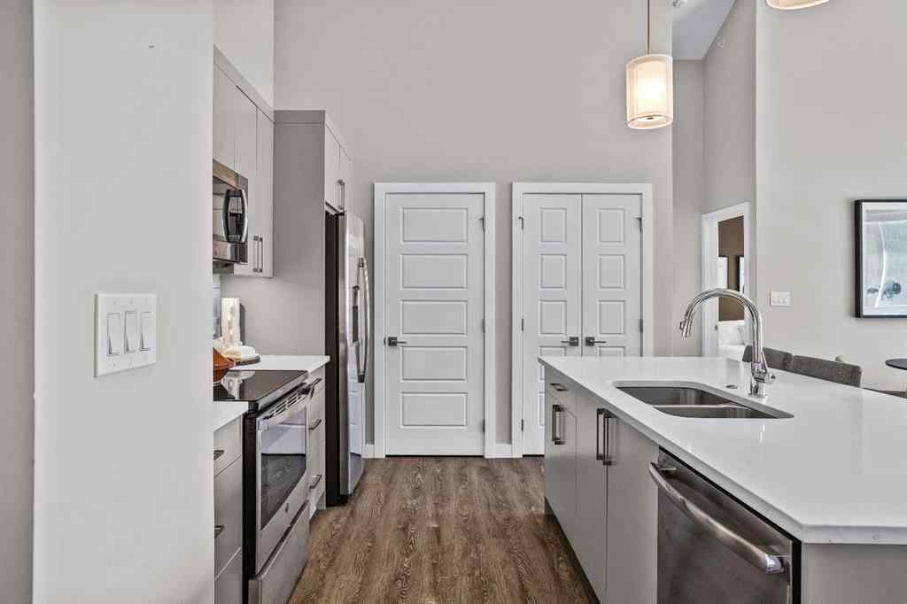 MLS® A2222314 - Unit #316 106 Stewart Creek Rise  in Three Sisters Canmore, Residential