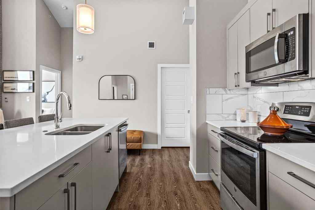 MLS® A2222314 - Unit #316 106 Stewart Creek Rise  in Three Sisters Canmore, Residential