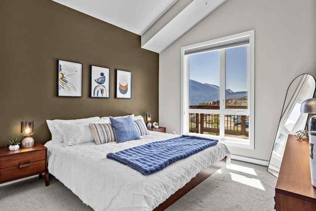 MLS® A2222314 - Unit #316 106 Stewart Creek Rise  in Three Sisters Canmore, Residential