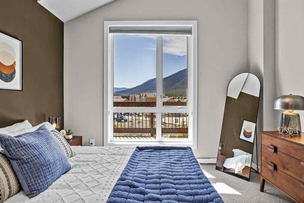 MLS® A2222314 - Unit #316 106 Stewart Creek Rise  in Three Sisters Canmore, Residential