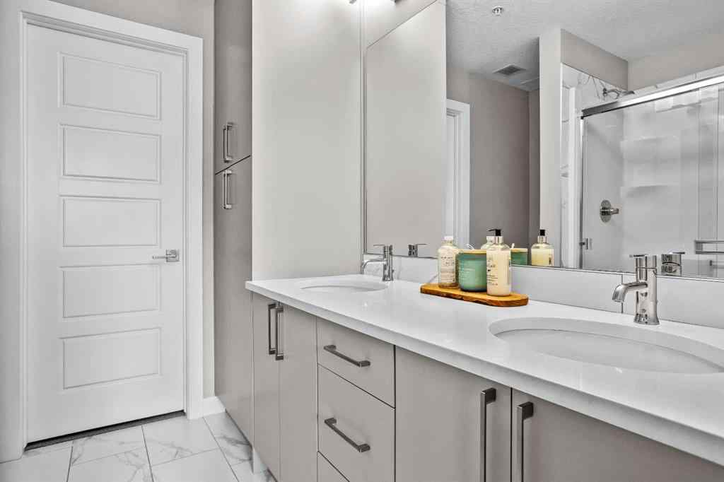 MLS® A2222314 - Unit #316 106 Stewart Creek Rise  in Three Sisters Canmore, Residential