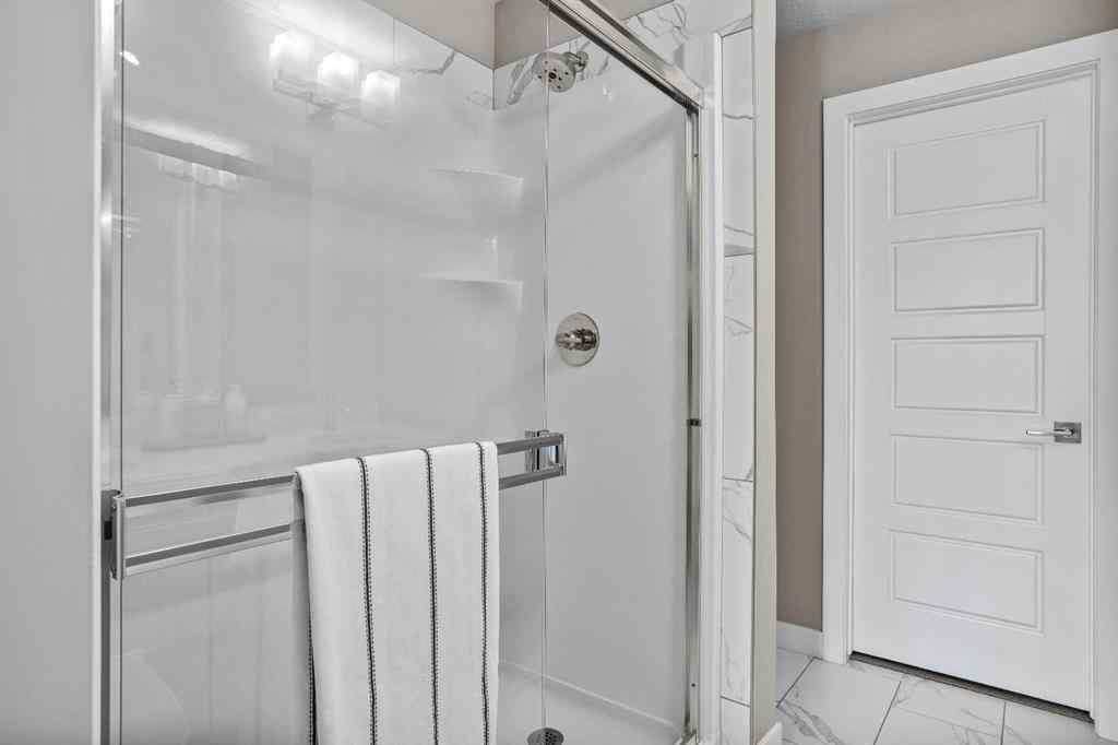 MLS® A2222314 - Unit #316 106 Stewart Creek Rise  in Three Sisters Canmore, Residential