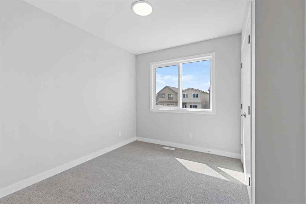 MLS® A2222351 - 7075 Rangeview Avenue SE in Rangeview Calgary, Residential