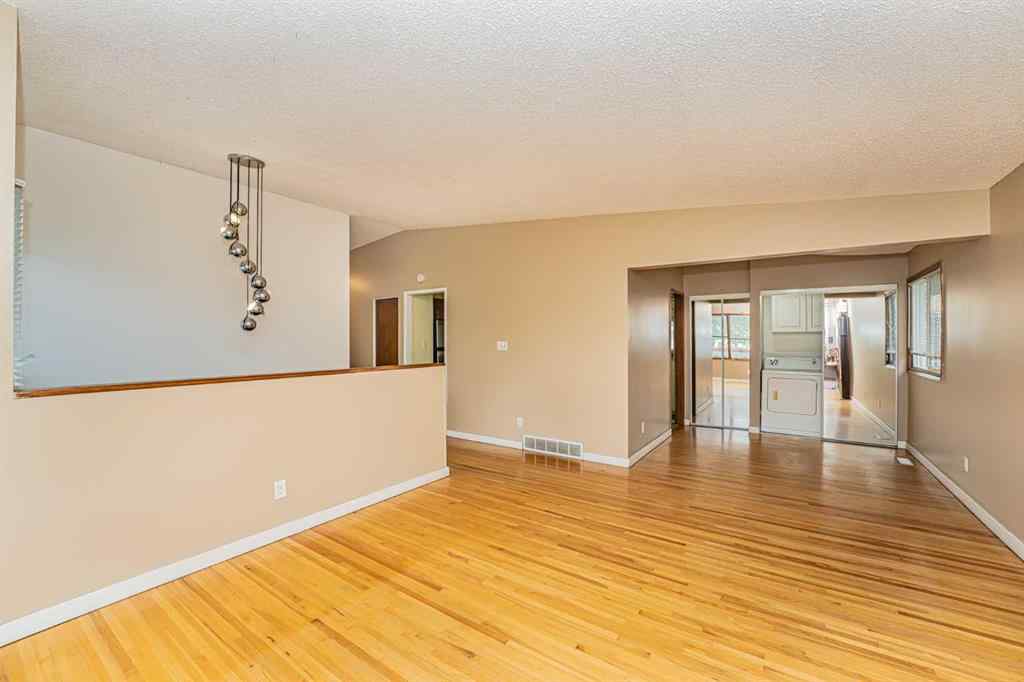 MLS® A2222629 - 7416 Hunterfield Road NW in Huntington Hills Calgary, Residential