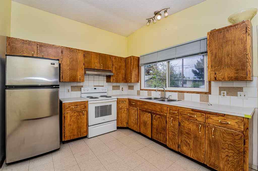 MLS® A2222629 - 7416 Hunterfield Road NW in Huntington Hills Calgary, Residential