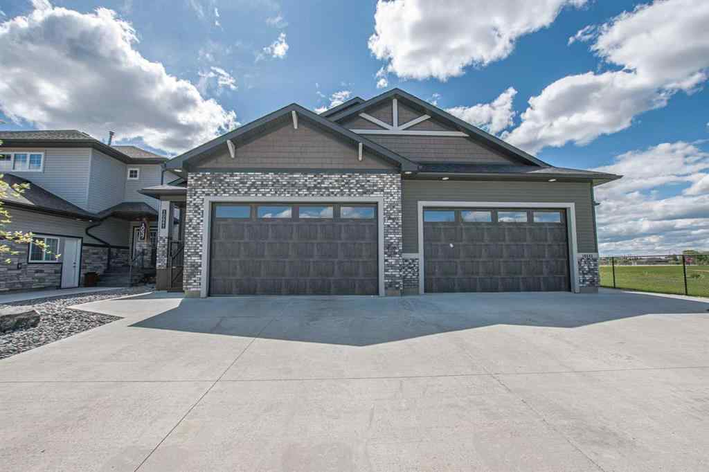 MLS® A2222862 - 10641 66 Avenue  in Stone Ridge Grande Prairie, Residential