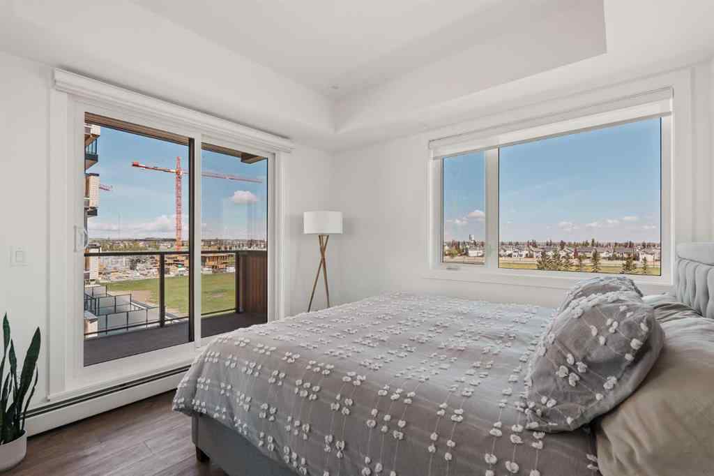 MLS® A2222901 - Unit #401 8230 Broadcast Avenue SW in West Springs Calgary, Residential
