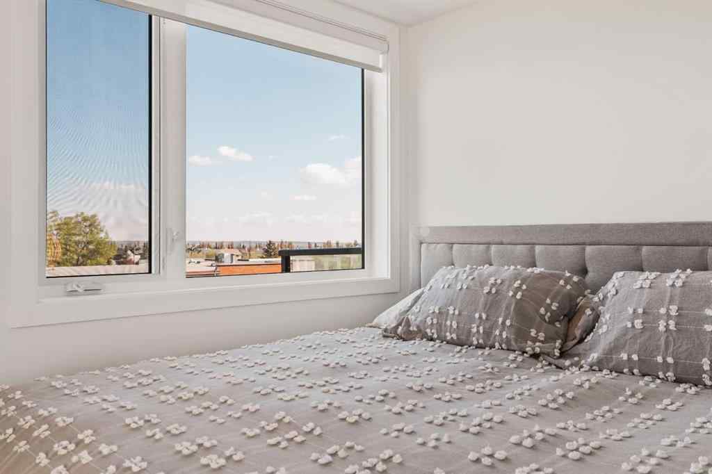 MLS® A2222901 - Unit #401 8230 Broadcast Avenue SW in West Springs Calgary, Residential