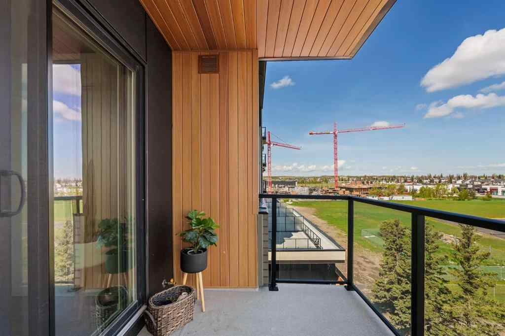 MLS® A2222901 - Unit #401 8230 Broadcast Avenue SW in West Springs Calgary, Residential