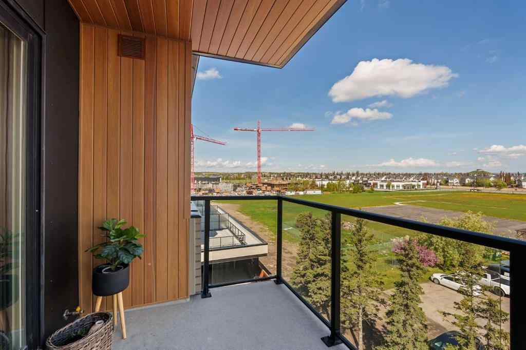 MLS® A2222901 - Unit #401 8230 Broadcast Avenue SW in West Springs Calgary, Residential