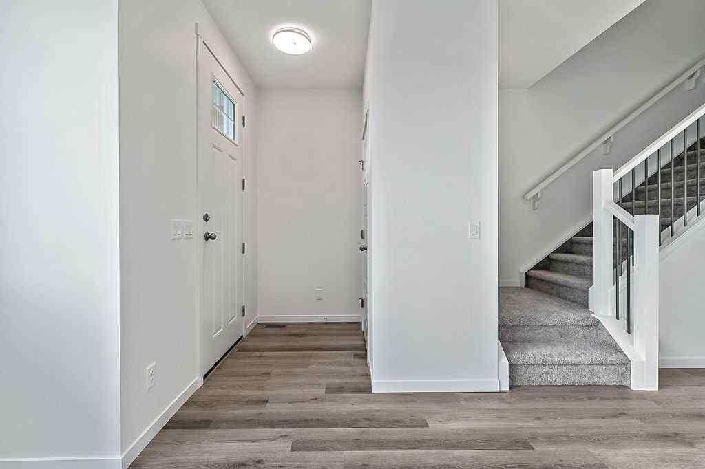 MLS® A2222964 - 838 Creekside Boulevard SW in Pine Creek Calgary, Residential