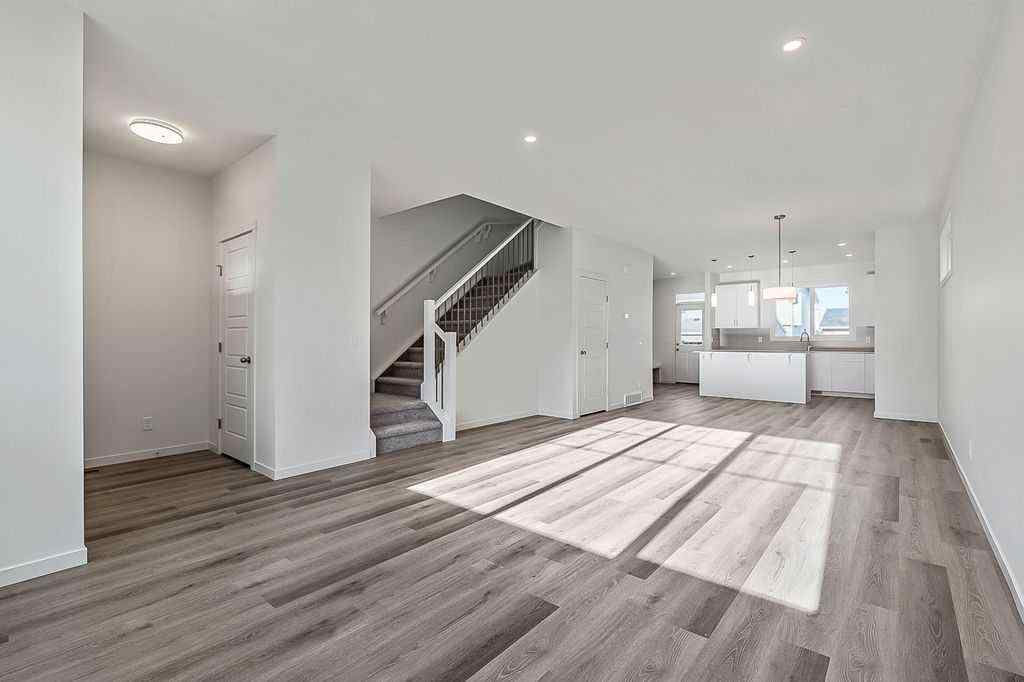 MLS® A2222964 - 838 Creekside Boulevard SW in Pine Creek Calgary, Residential