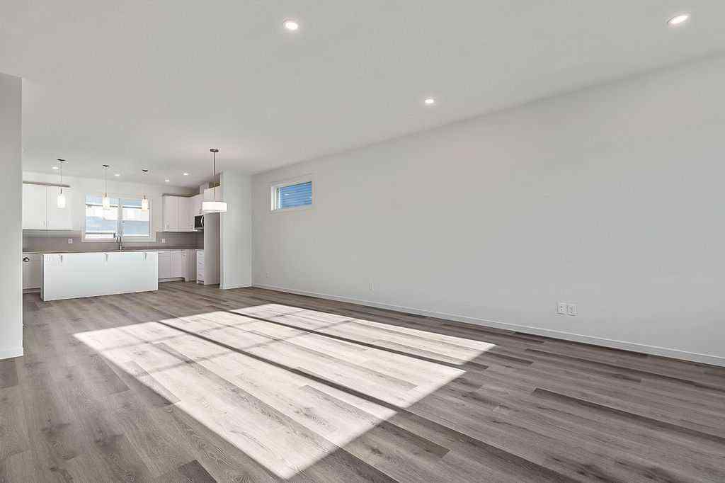 MLS® A2222964 - 838 Creekside Boulevard SW in Pine Creek Calgary, Residential