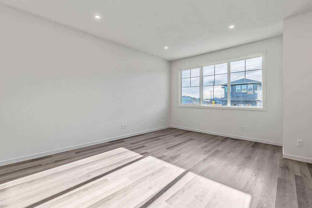 MLS® A2222964 - 838 Creekside Boulevard SW in Pine Creek Calgary, Residential