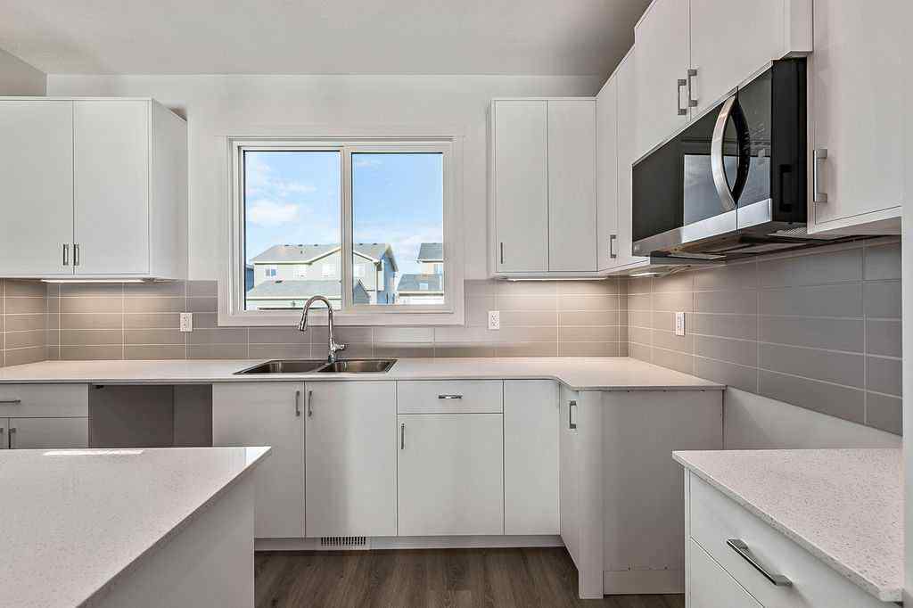 MLS® A2222964 - 838 Creekside Boulevard SW in Pine Creek Calgary, Residential