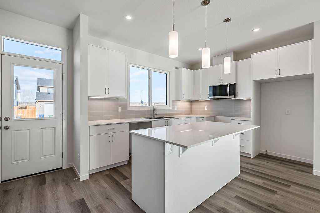 MLS® A2222964 - 838 Creekside Boulevard SW in Pine Creek Calgary, Residential