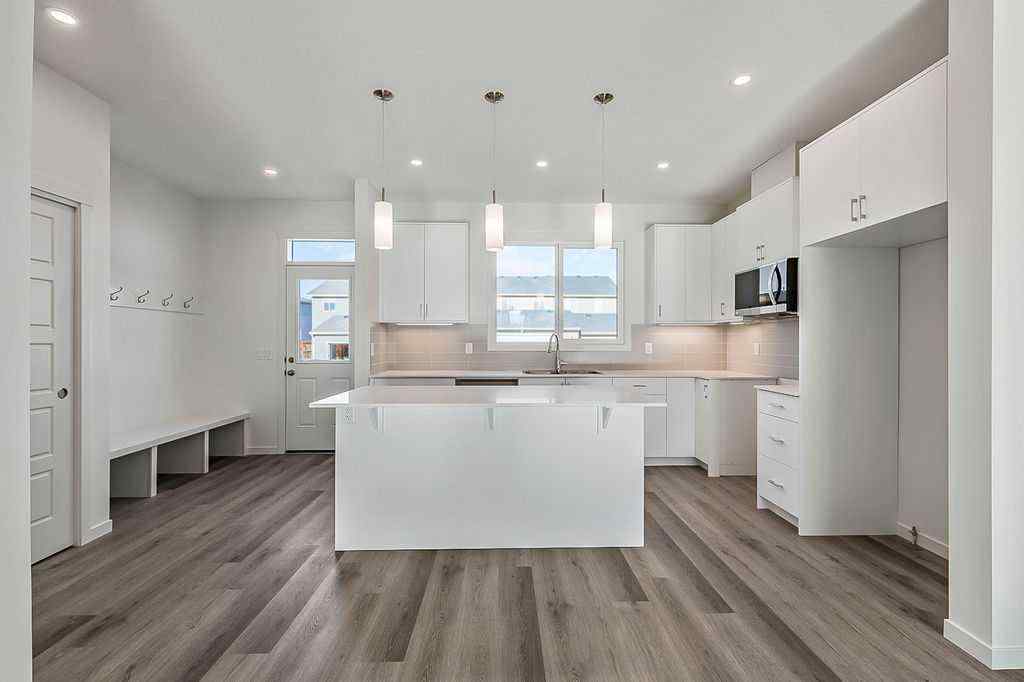 MLS® A2222964 - 838 Creekside Boulevard SW in Pine Creek Calgary, Residential