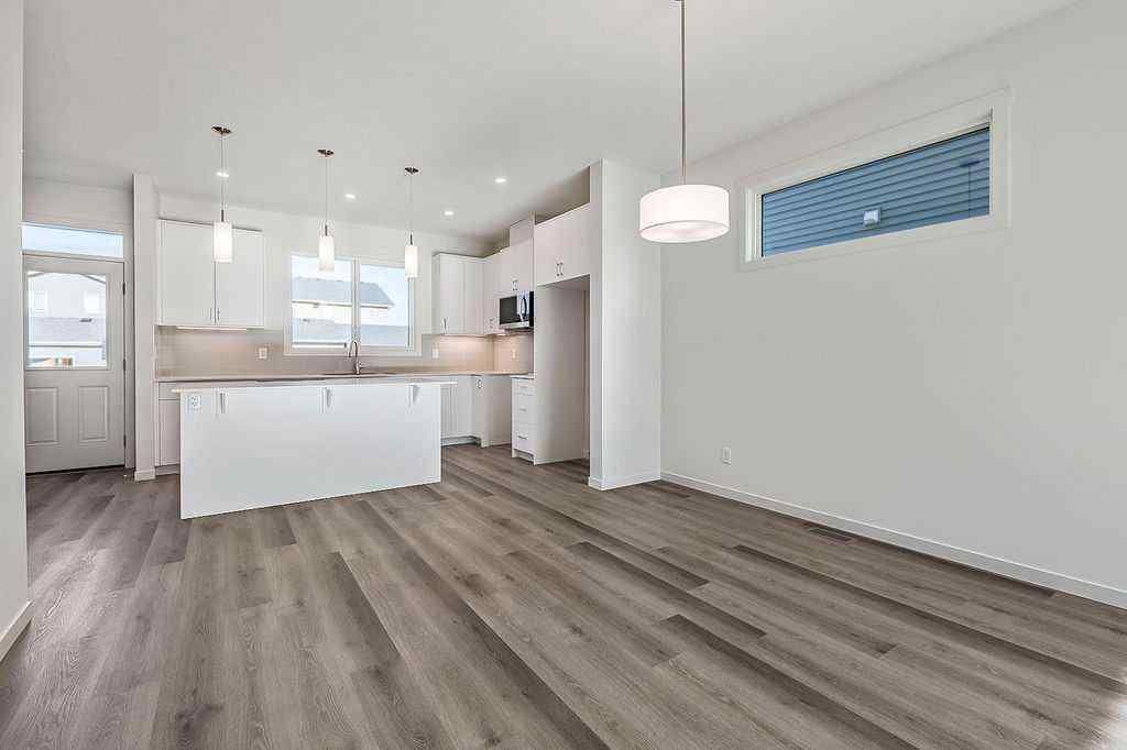 MLS® A2222964 - 838 Creekside Boulevard SW in Pine Creek Calgary, Residential