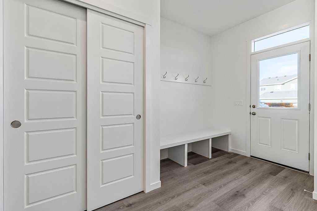 MLS® A2222964 - 838 Creekside Boulevard SW in Pine Creek Calgary, Residential