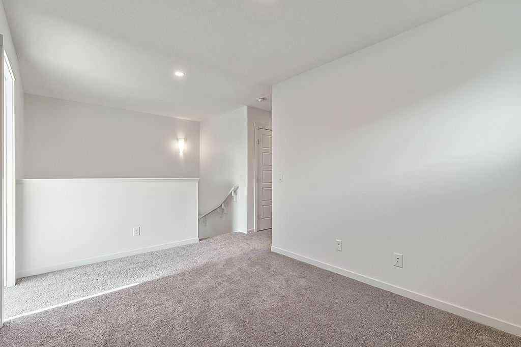 MLS® A2222964 - 838 Creekside Boulevard SW in Pine Creek Calgary, Residential