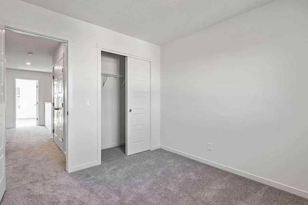MLS® A2222964 - 838 Creekside Boulevard SW in Pine Creek Calgary, Residential