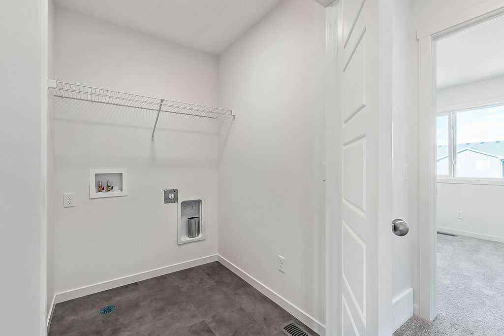 MLS® A2222964 - 838 Creekside Boulevard SW in Pine Creek Calgary, Residential
